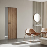 Single pocket door system Absolute Evo Singolo suited to 12,5 cm double layer walls