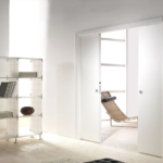 Double sliding door system Evolution Doppio suited to 12,5 cm walls