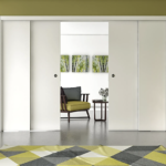 Sliding double pocket door system Staffetta Double for telescopic doors suited to 18 cm walls