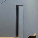 Curved sliding single pocket door system Arkimede suited to 12,5 cm walls